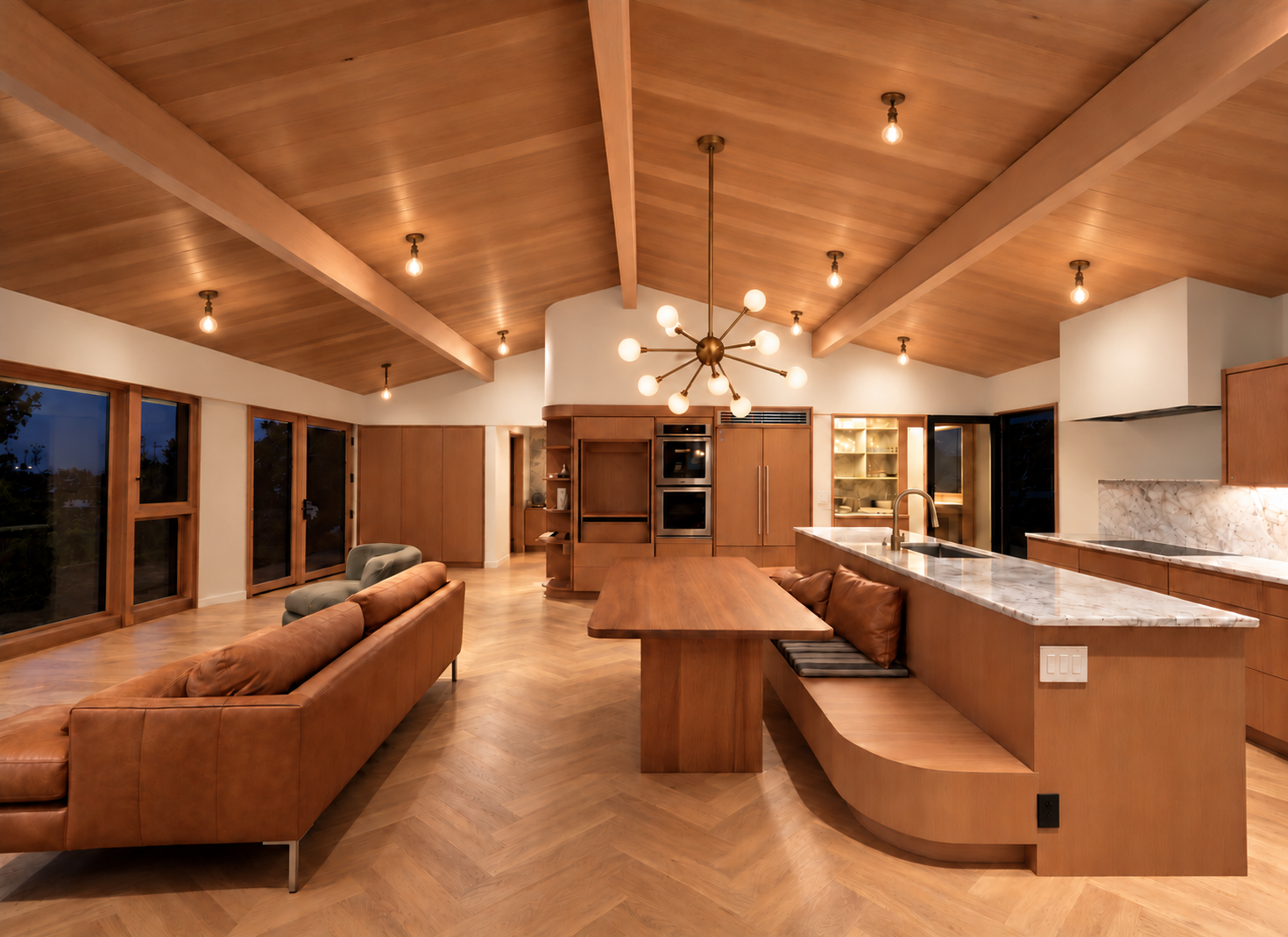 Wood kitchen cabinetry, island, and ceiling in an open living space